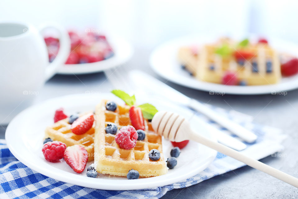 Delicious Belgium waffles with berries