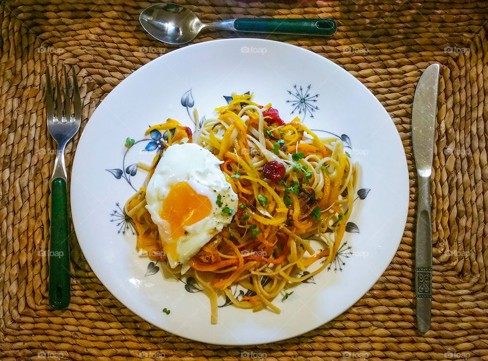 Delicious pasta dish on table