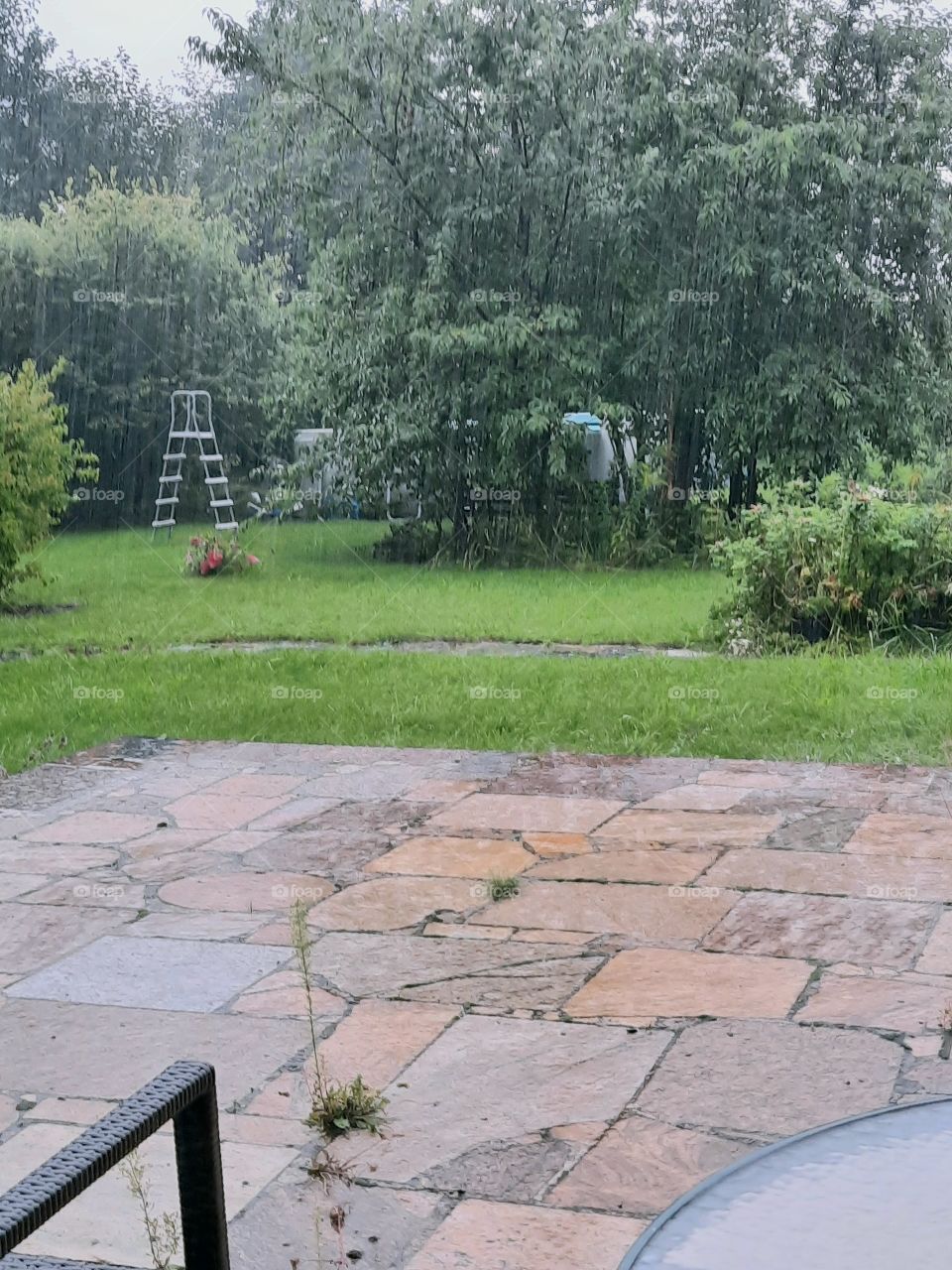 heavy rain seen through the window