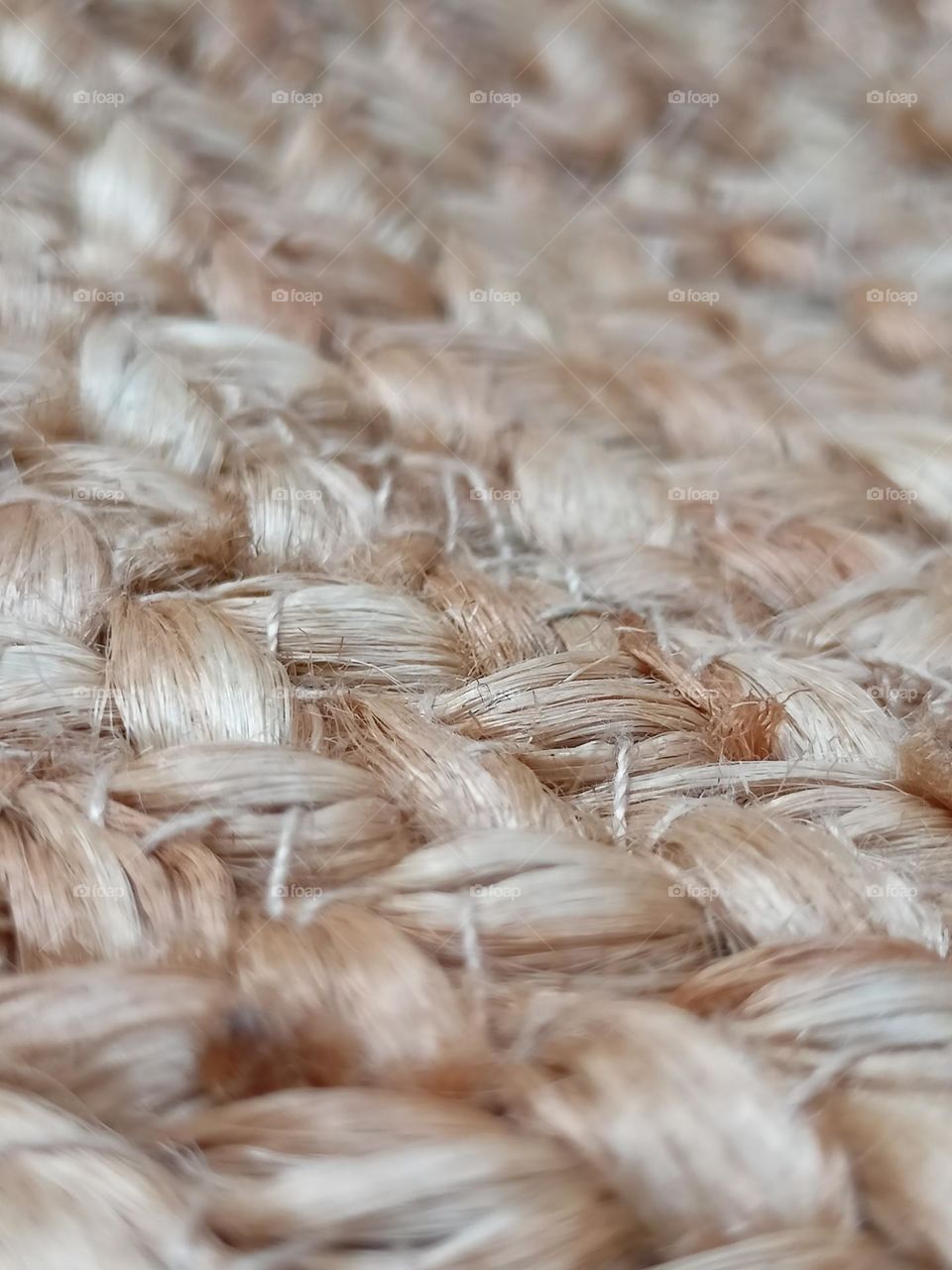 Braided jute closeup. Jute fibres and thread of a foot stool