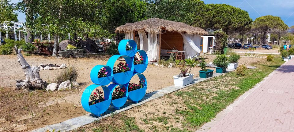 blue metallic circles with colorful flowers