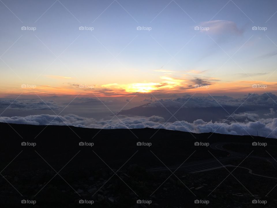 Scenic view of dramatic sky at sunset