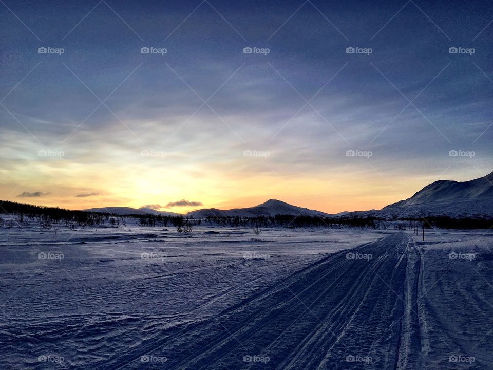 Sunset in winter landscape 