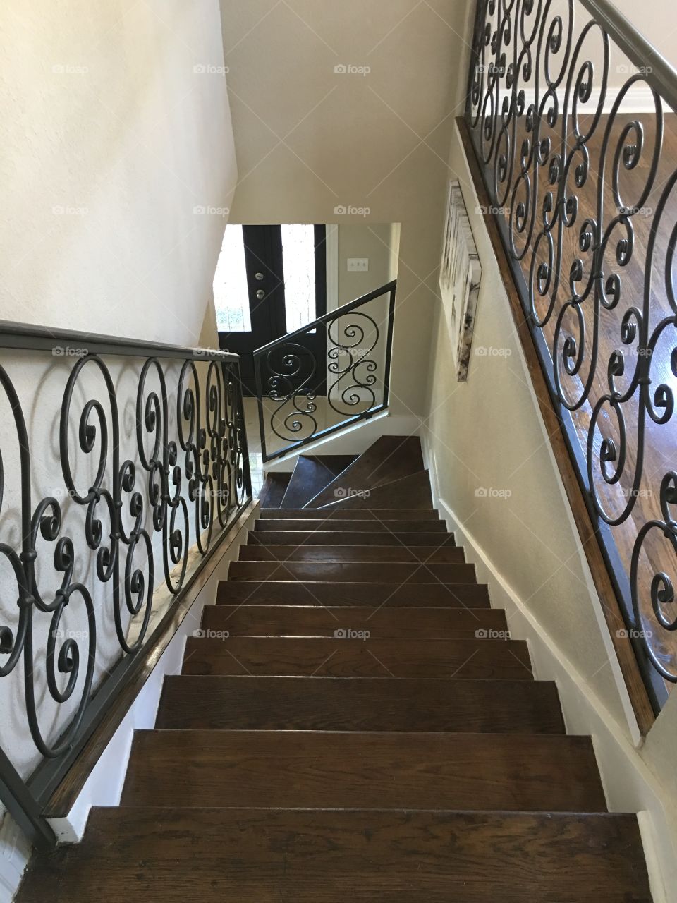 Stairway, stairwell, wooden steps with wrought iron railings, old house, hardwood floors
