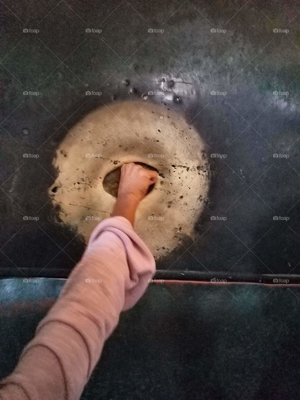 a finger hole in a sacred column in the aya sofia in Istanbul Turkey