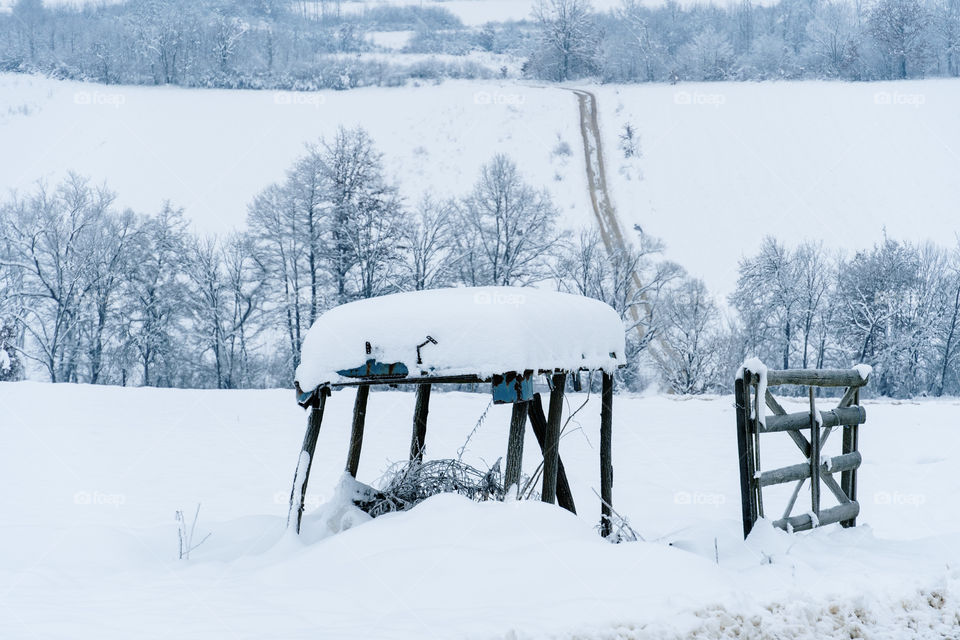 Snow covered old shack