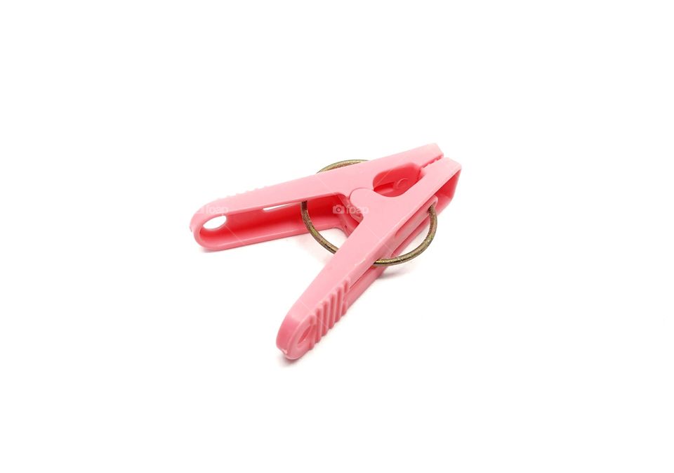 Pink cloth clamp on white background