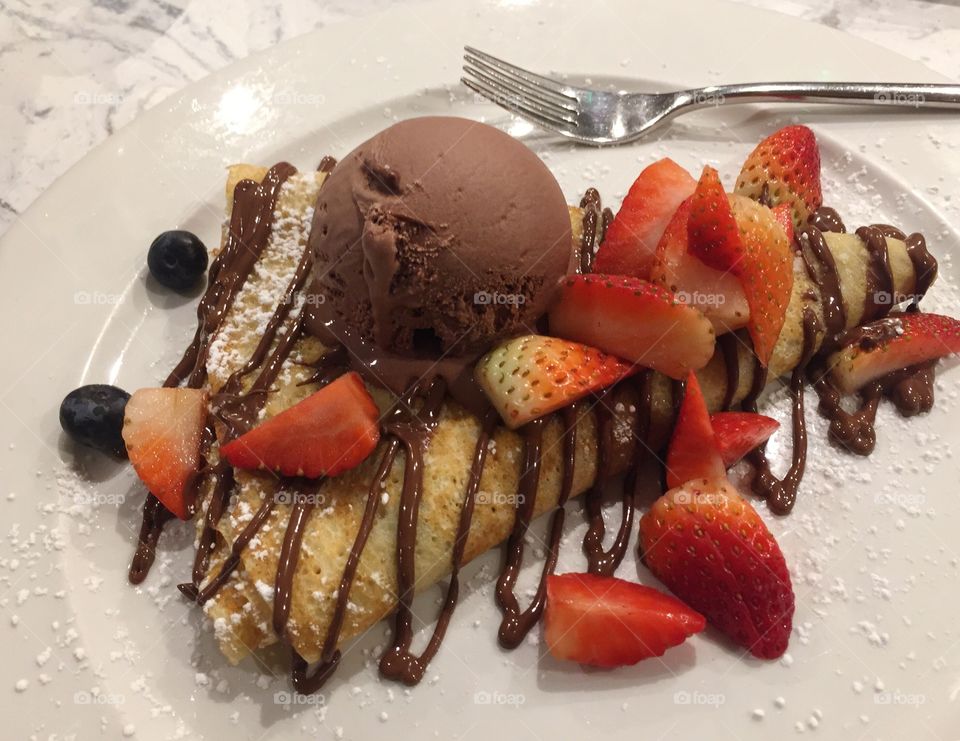 Pancake with chocolate ice cream and strawberries 🍓 