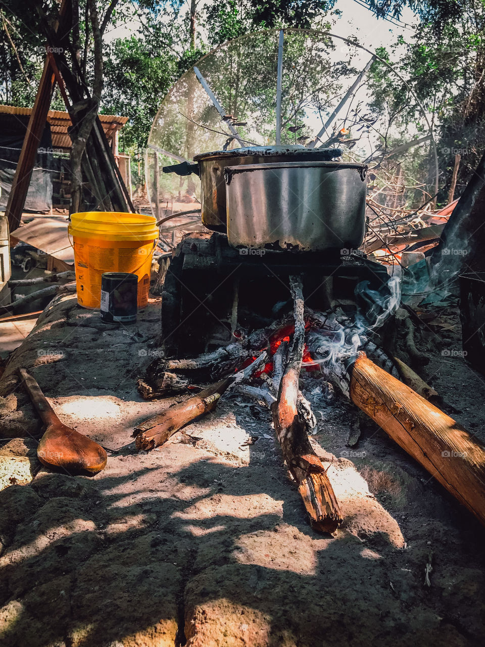 house on the farm with pots on the clay stove, here is root