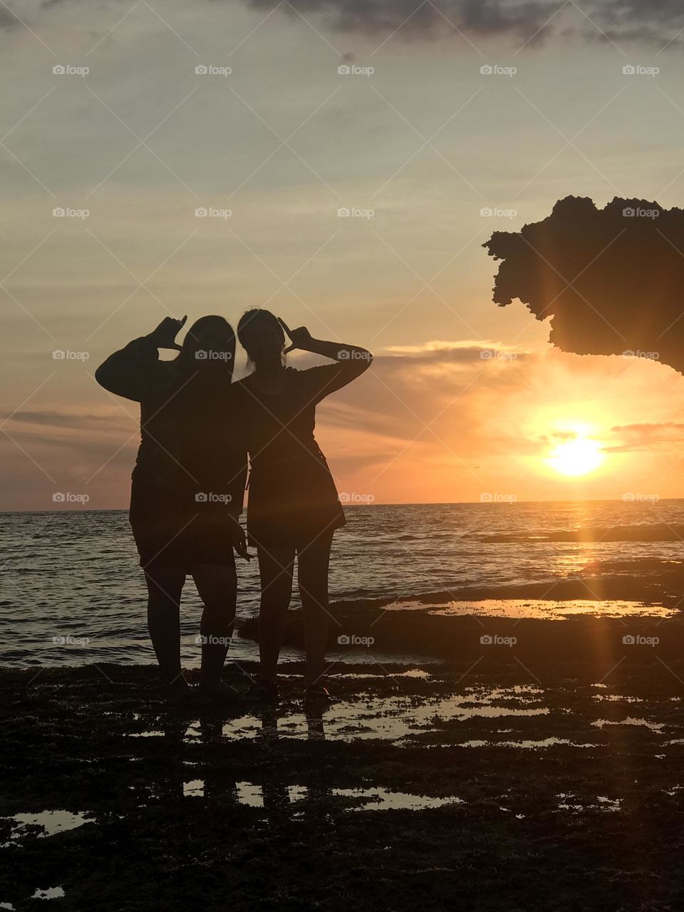 Silhouette of a Mother and Daughter sunset photos