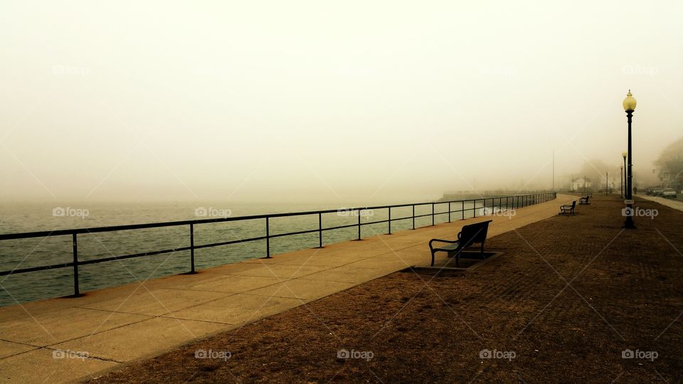 a foggy day on the coast. the fog rolls in on the coast