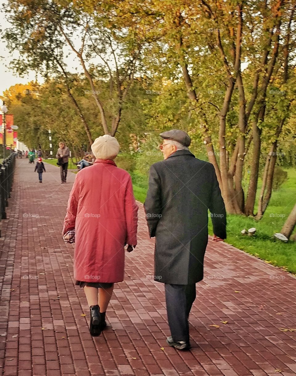 You may see this older couple who went fir a walk and further down a yanger people.