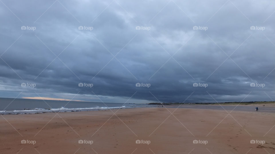 beach sky grey clouds by emmam