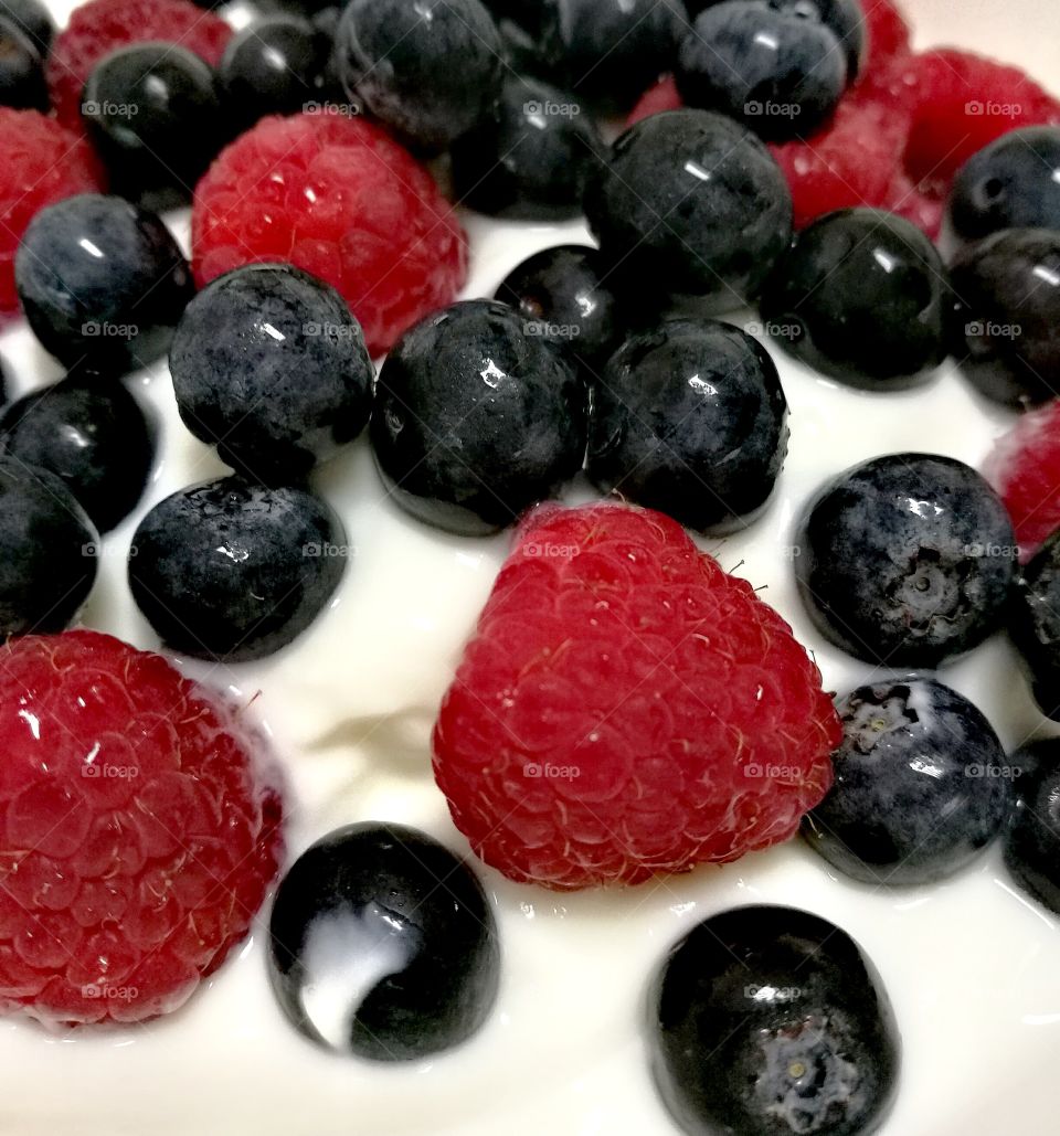 Fresh berries and yogurt.