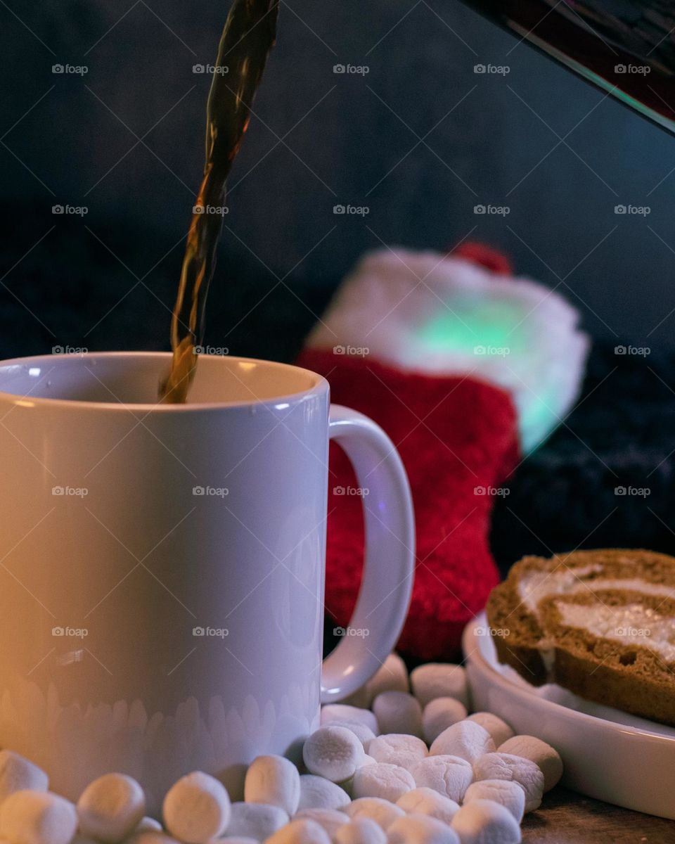 A cup of coffee and a pumpkin roll to start the Holiday season