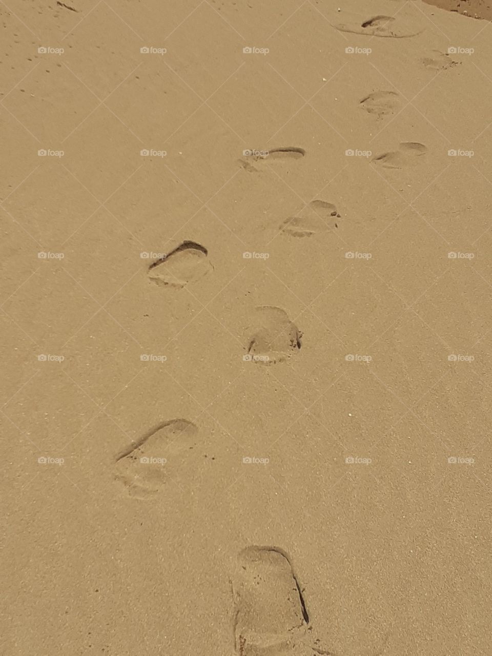 pegadas na areia