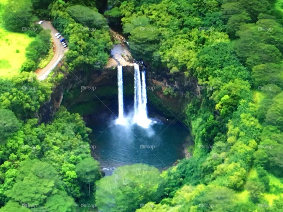 A gorgeous waterfall on the island of Kauai, Hawaii.