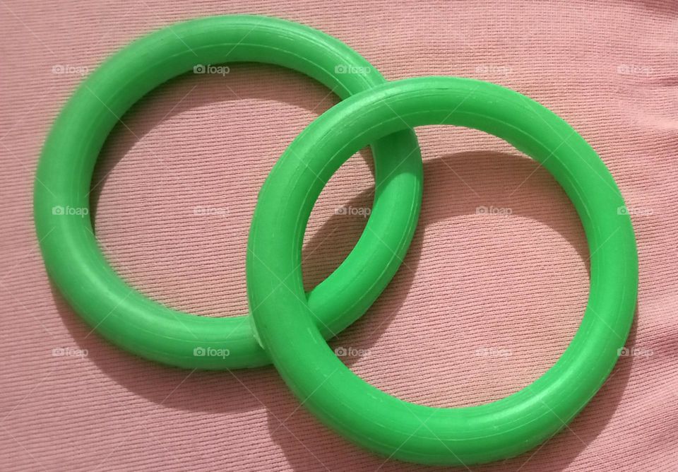 Geometry circle shapes rings using by children's to play. children's are like to play with this rings. Circle ⭕ 🔴 shape this plastic rings make children's happy and healthy.