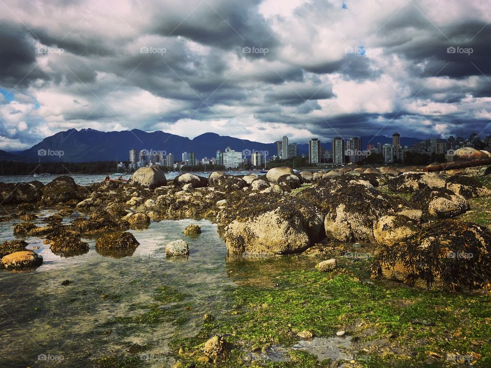 Vancouver skyline from the beach at low tide