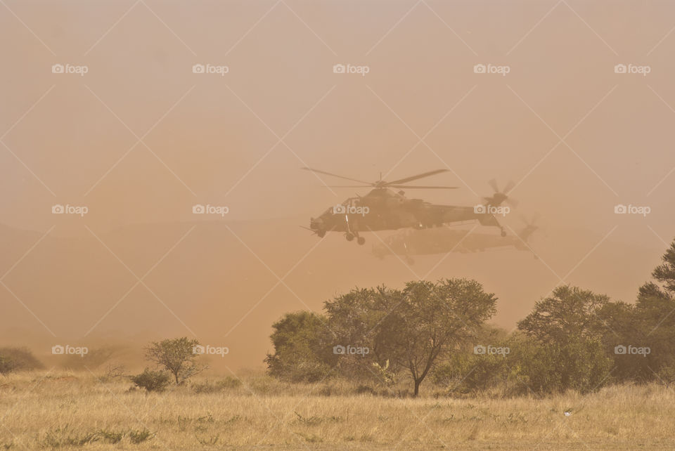 red dust from helicopter
