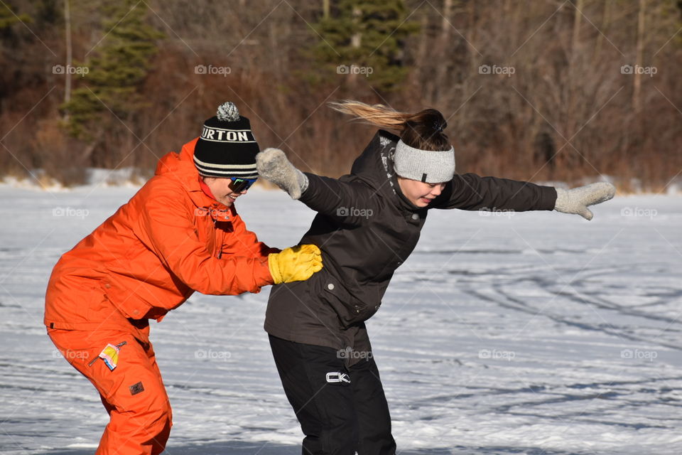 Brother and sister skating