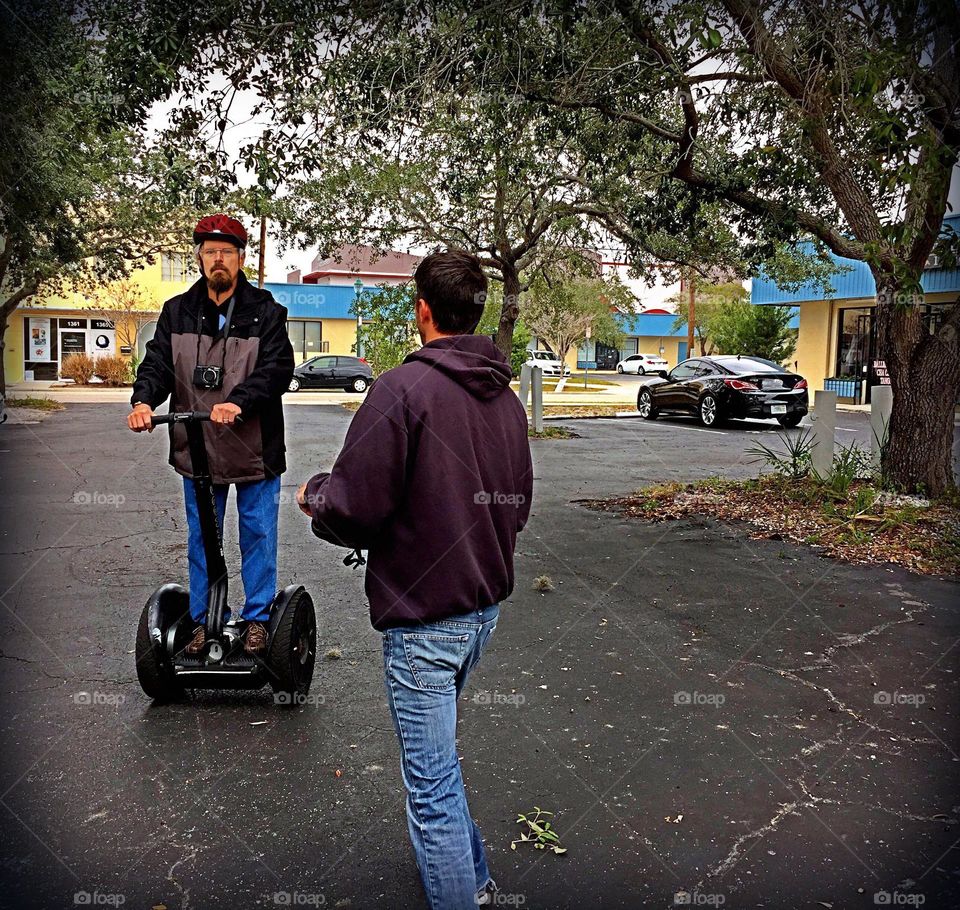 Public transportation -commuting on a Segway people mover.