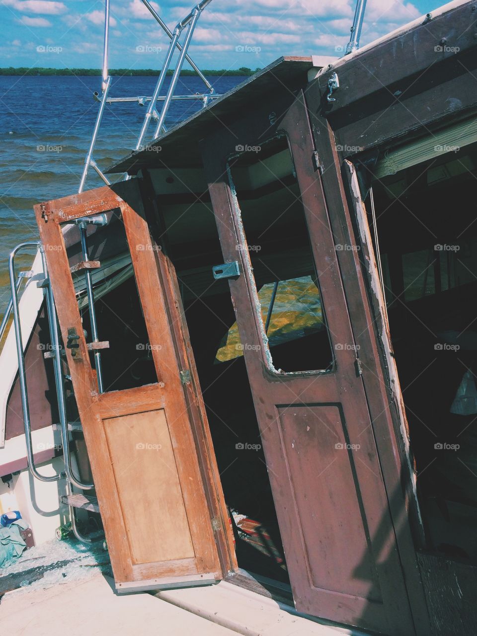 Broken windows of a boat after a wind storm in Florida.