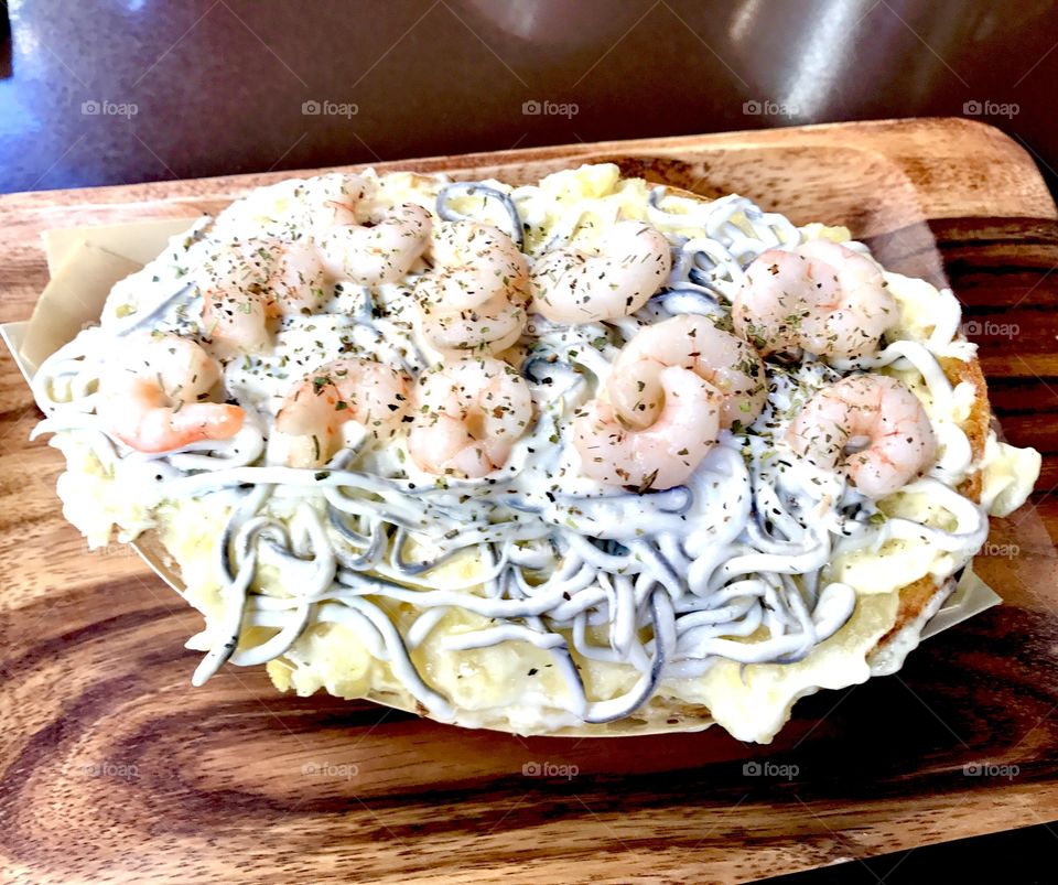 Delicious potato with sour cream, mashroom spaghetti and shrimps