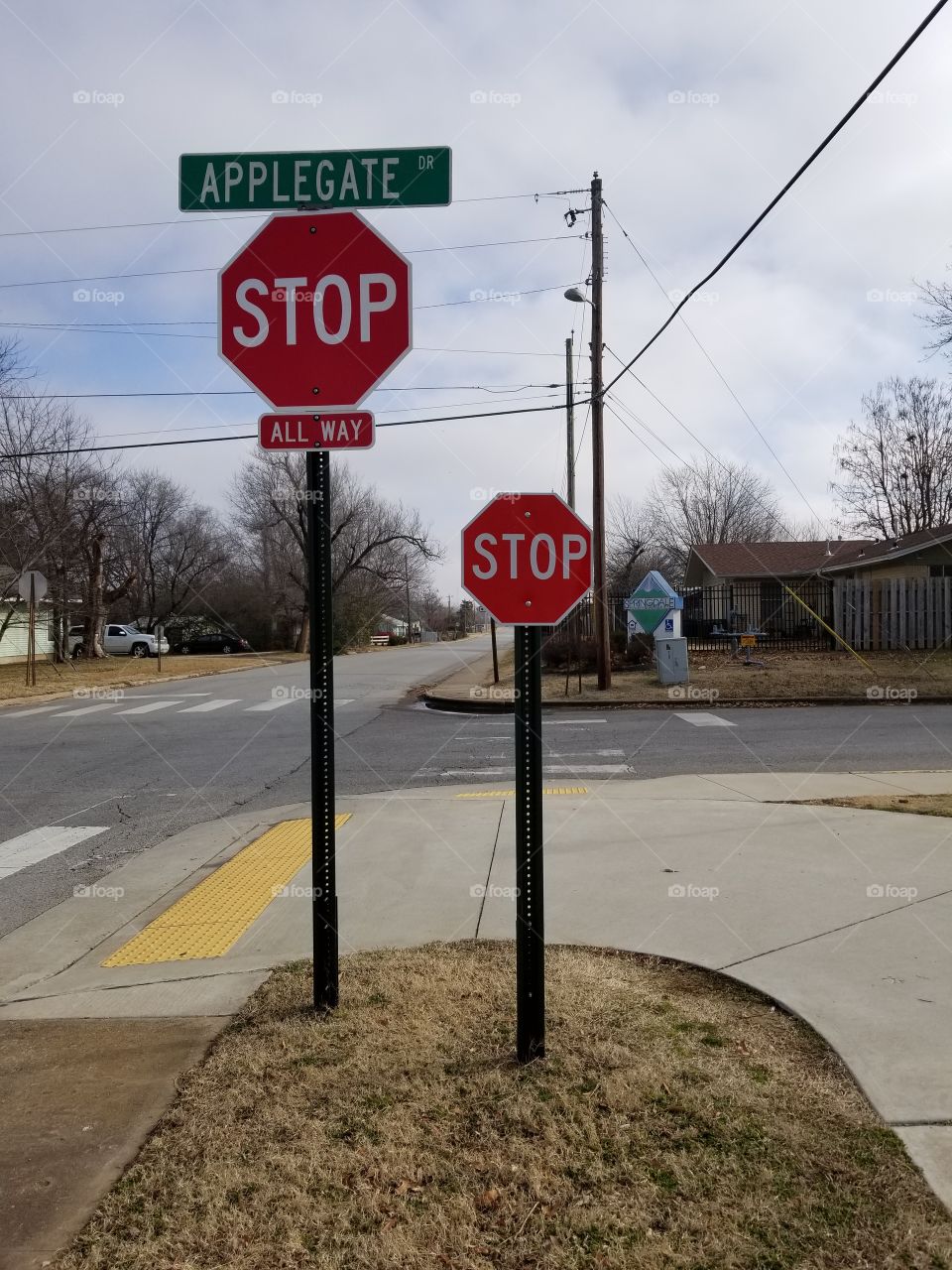 Big Stop Sign and Little Stop Sign. Growing up. Starting out young. Bike trail stop sign down low.