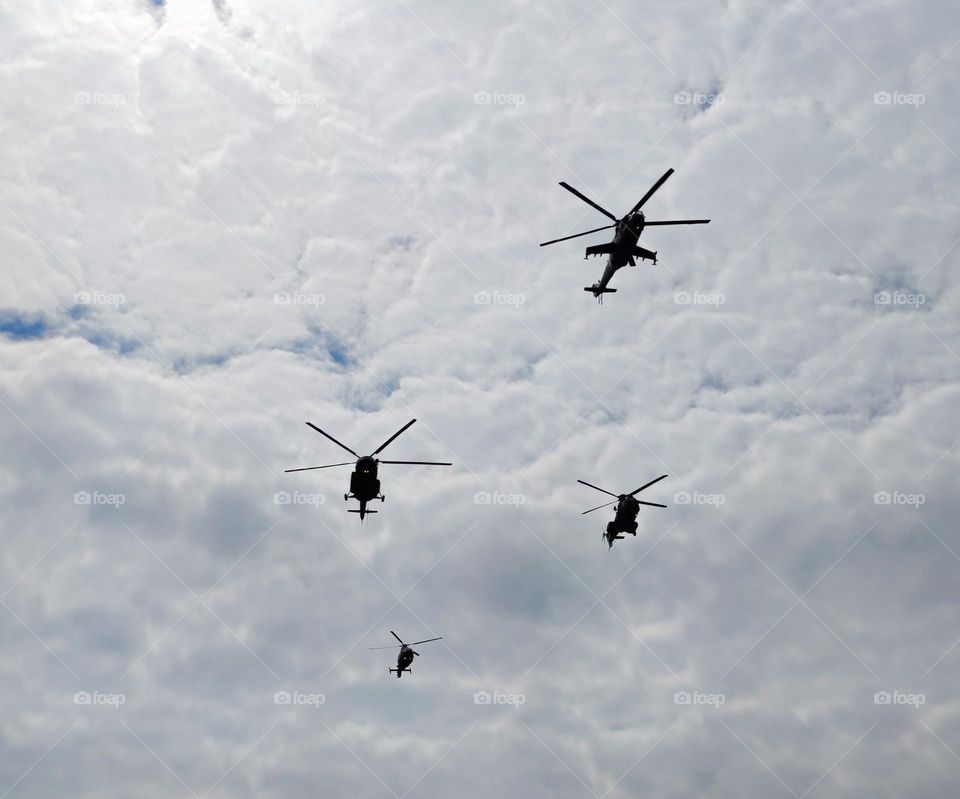 Four helicopters over the city