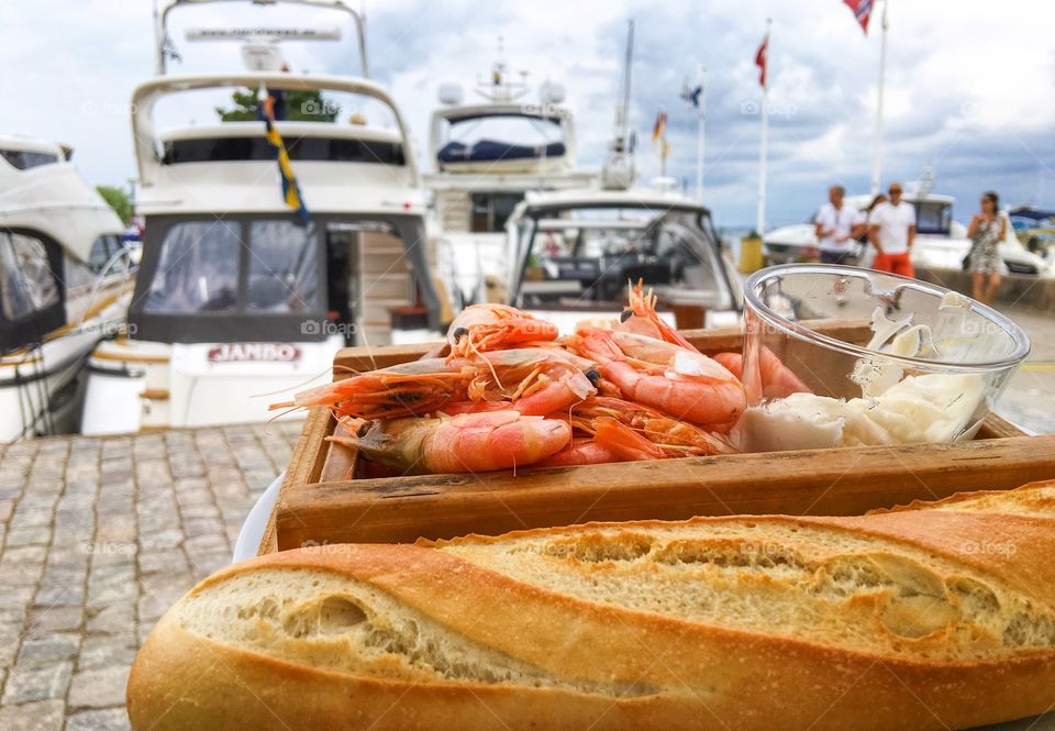 Close-up of food in front car parked