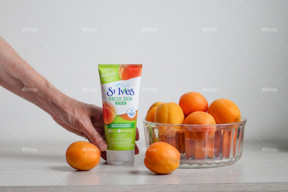 St.Ives apricot scrub in lady's hand