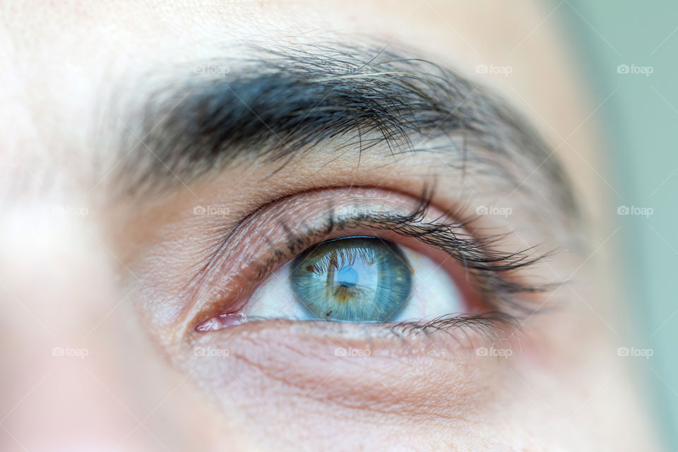 Closeup eye of a young man