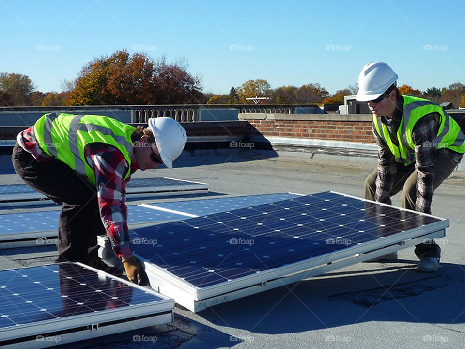 Solar panel install with technician