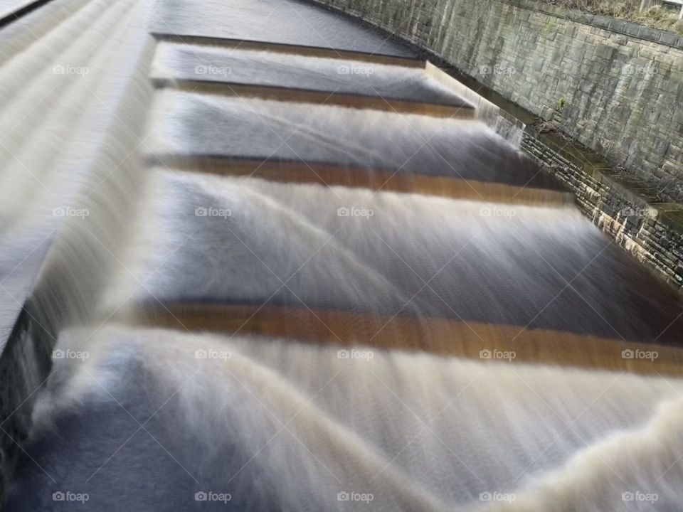 Tranquil waterfall- the fury of water captured in a calm flowing motion