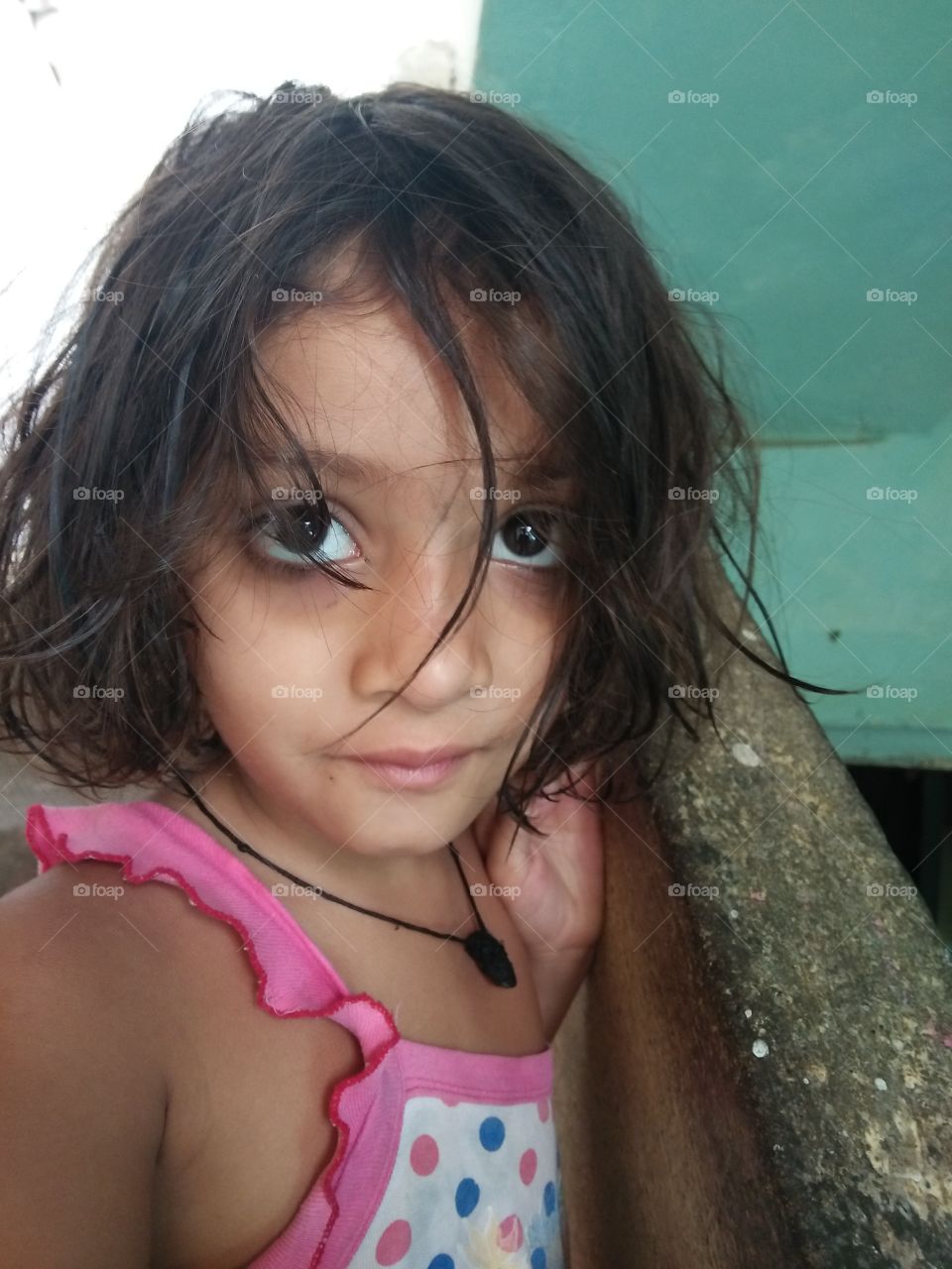 Portrait of a girl with messy hairs