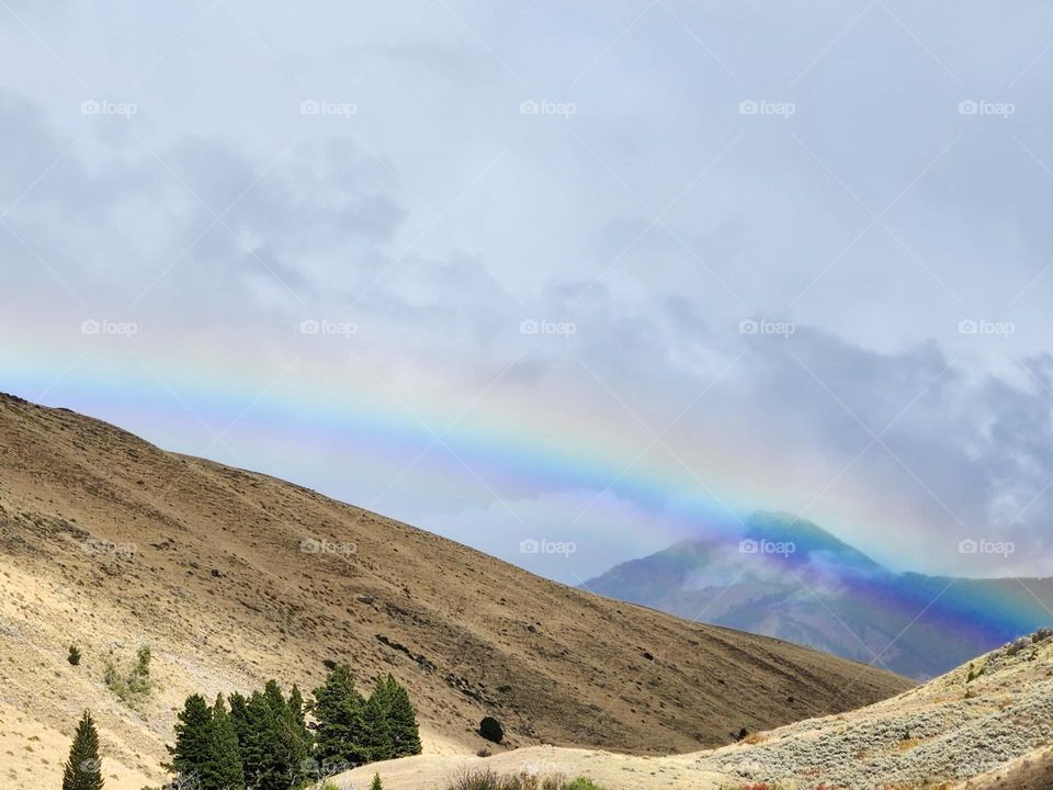 Hill side rainbow