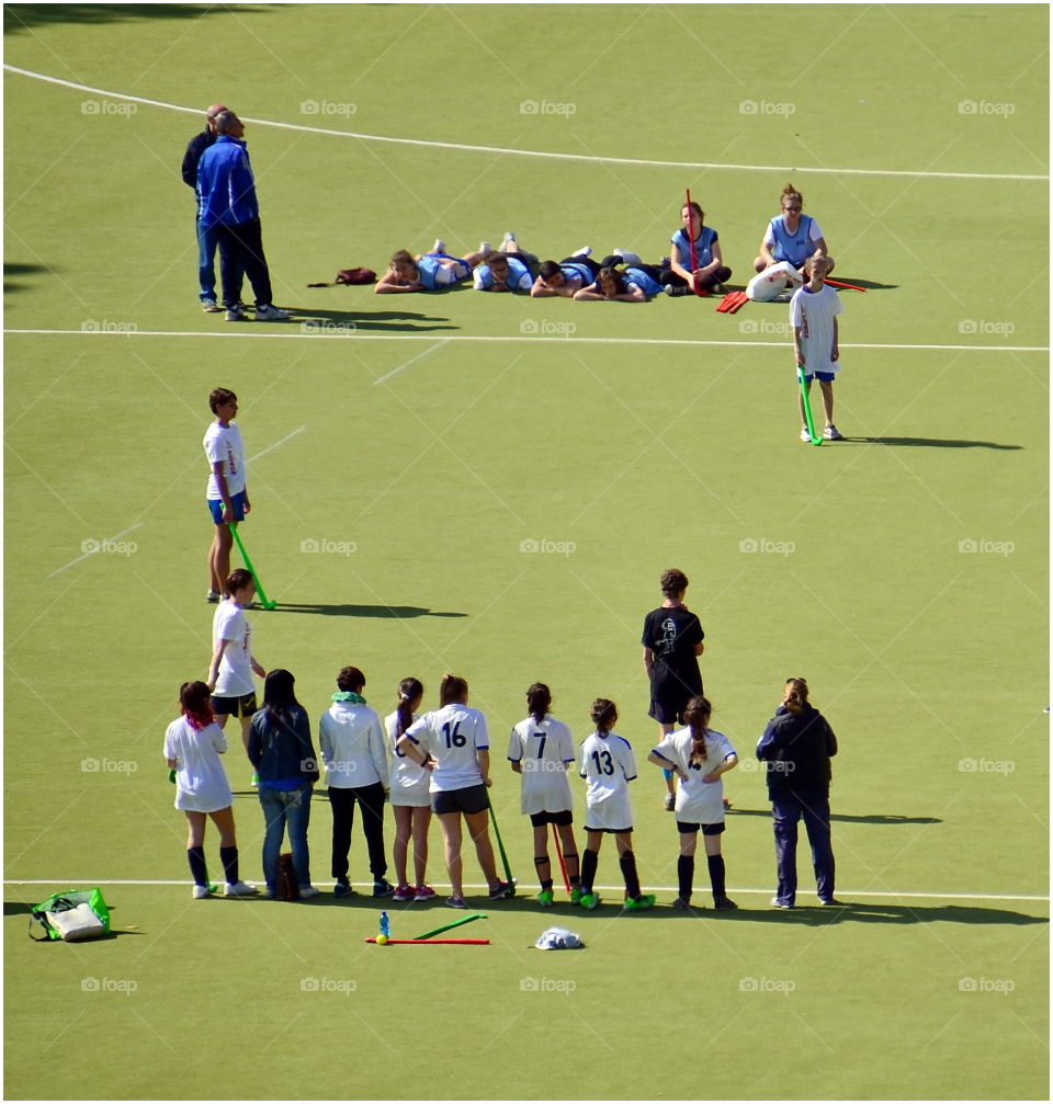 Field hockey. the girls are getting ready to start a game