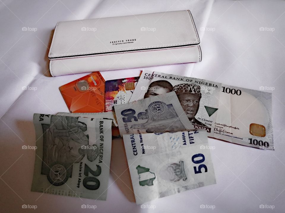 A flatlay photo of the Nigerian currency