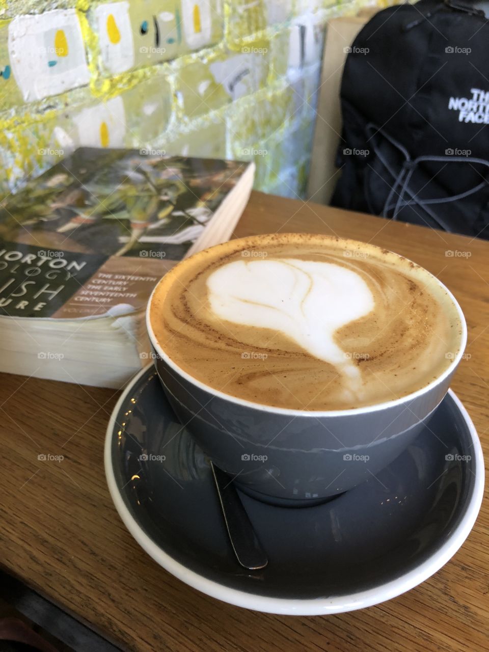 Coffee shop cappuccino plus book