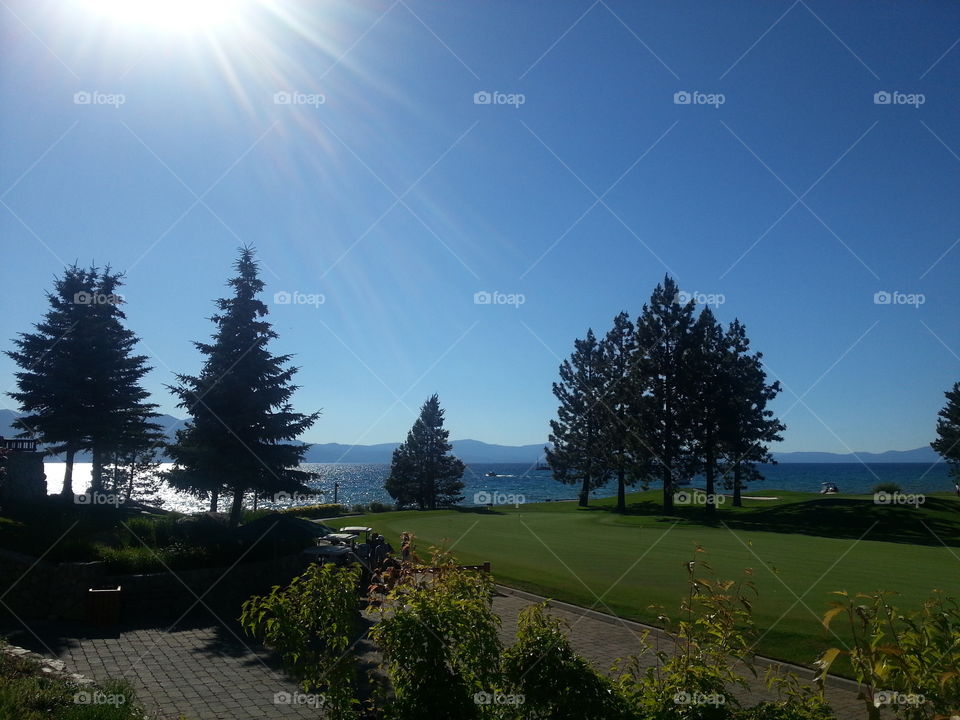 Golf course by the lake.