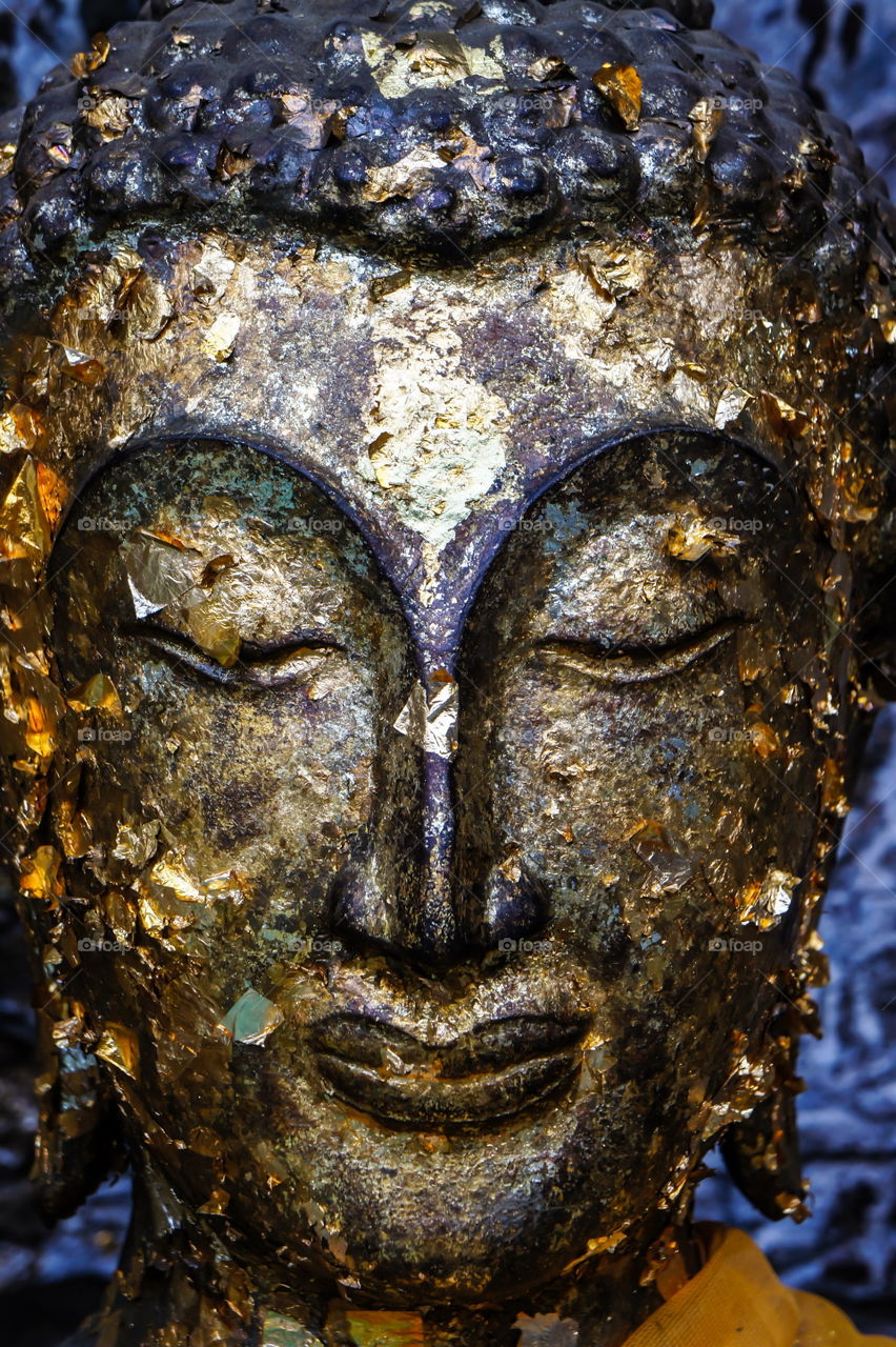 ancient golden buddha statue