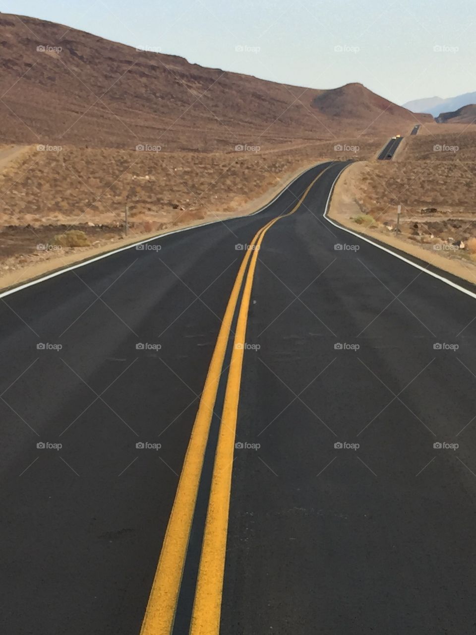 View of empty road in desert
