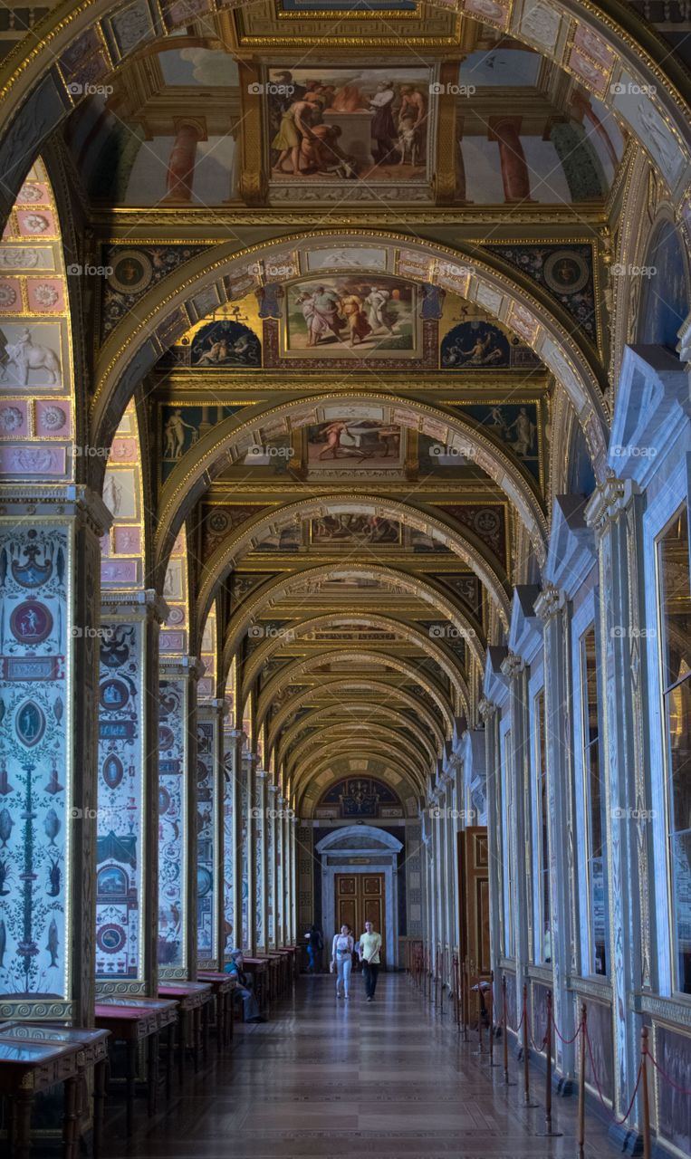 Artistic Vatican hallway with arcs and painitgs