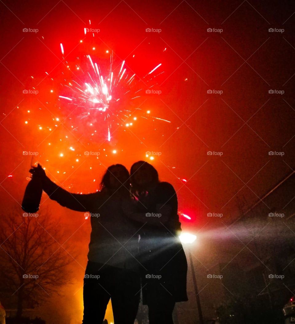 dark silhouet shadow with fireworks.
Loving couple together
