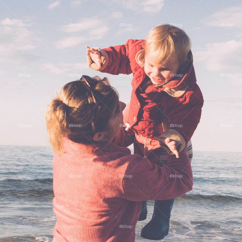 Woman playing with her daughter