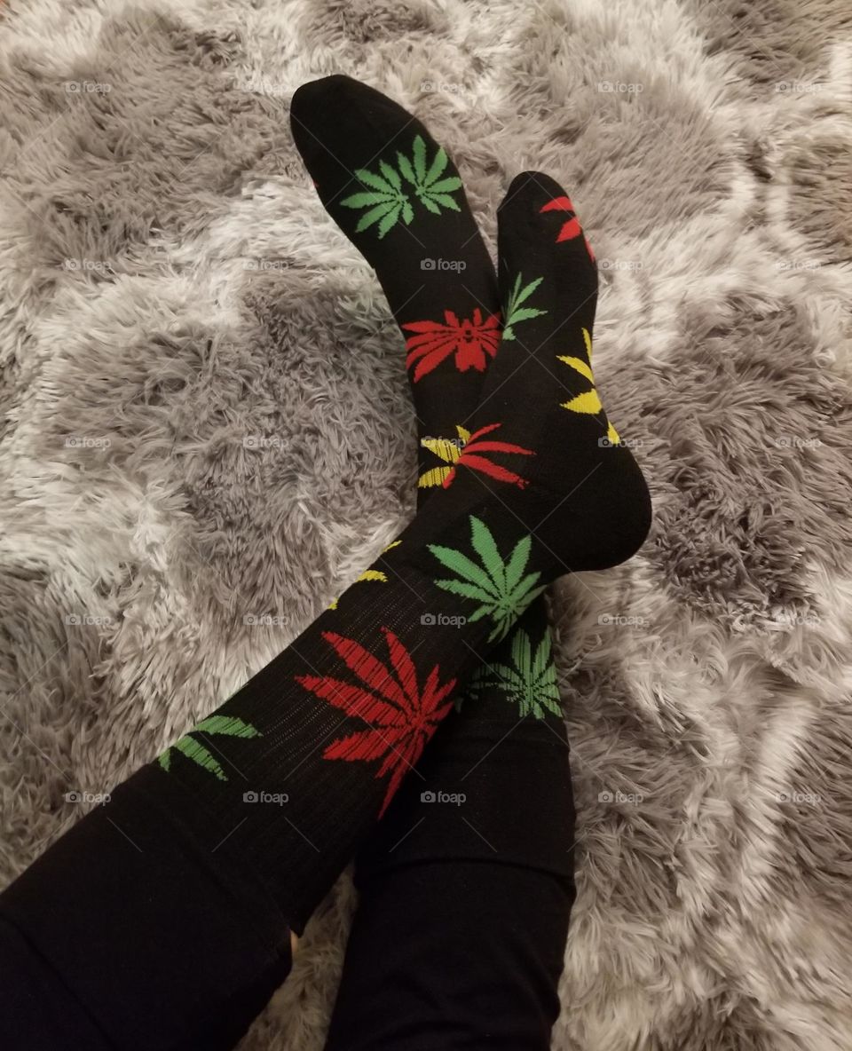 Popfizzy rasta colored weed socks.