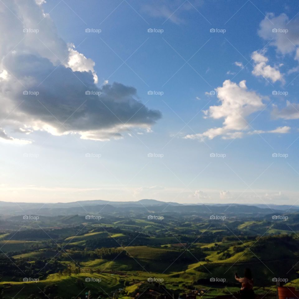 A range of mountains on a beautiful day  from a high top