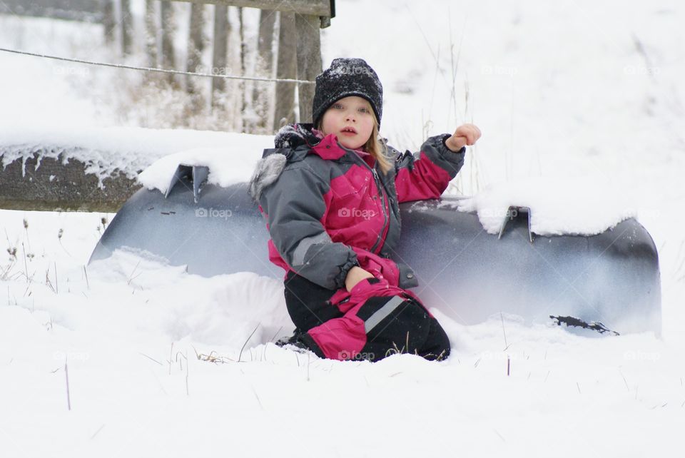 Girl playing in the snow