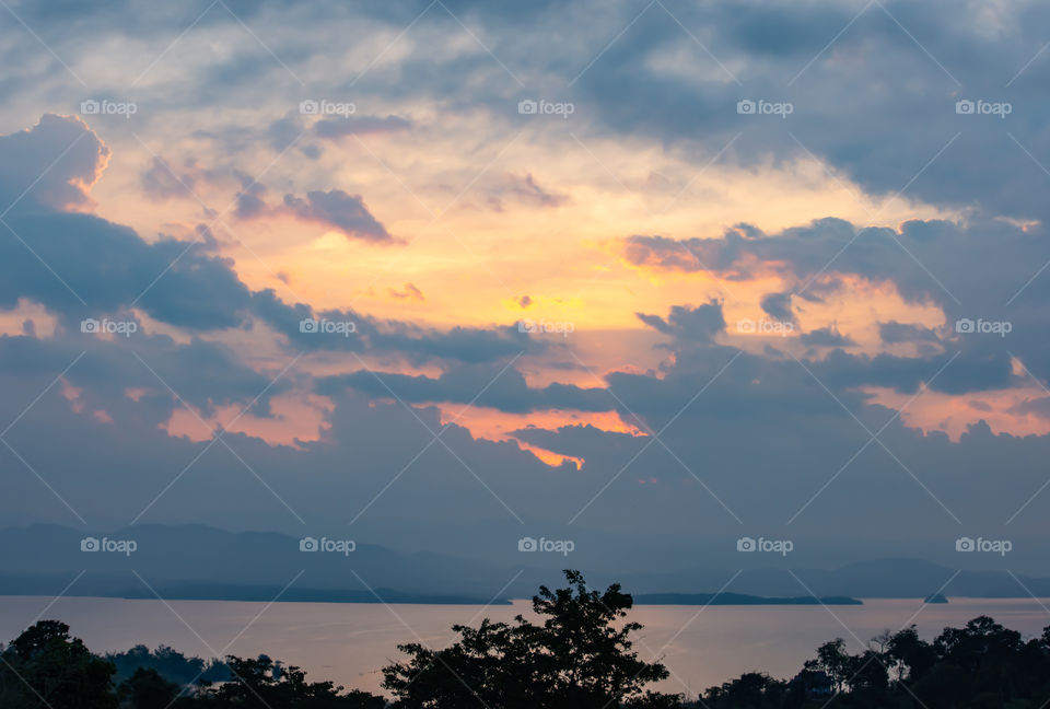 sunrise over Si Nakharin dam at Huay Mae khamin waterfall Nation